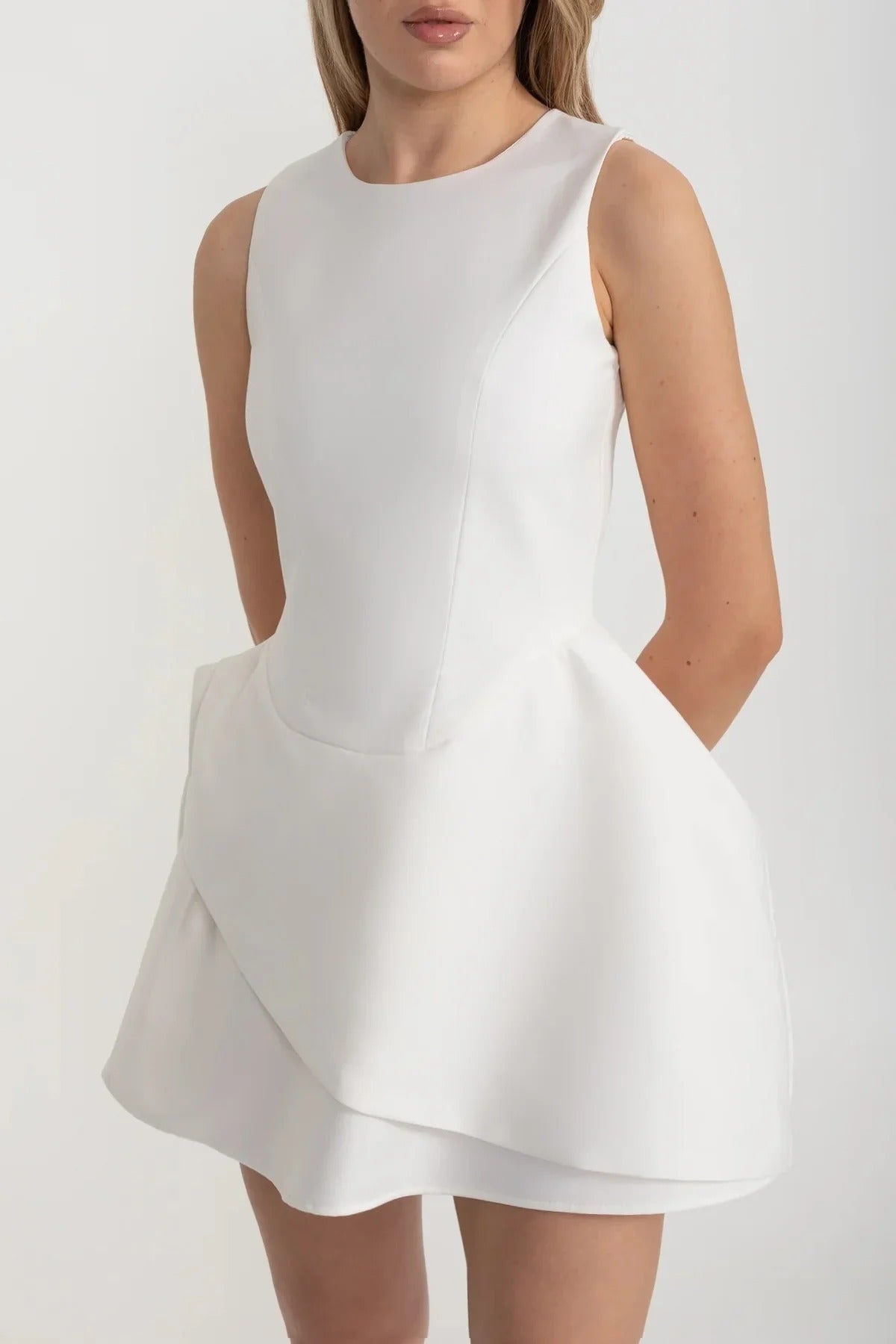 Sculpted Mini Dress with Overlapping Skirt Panel - White