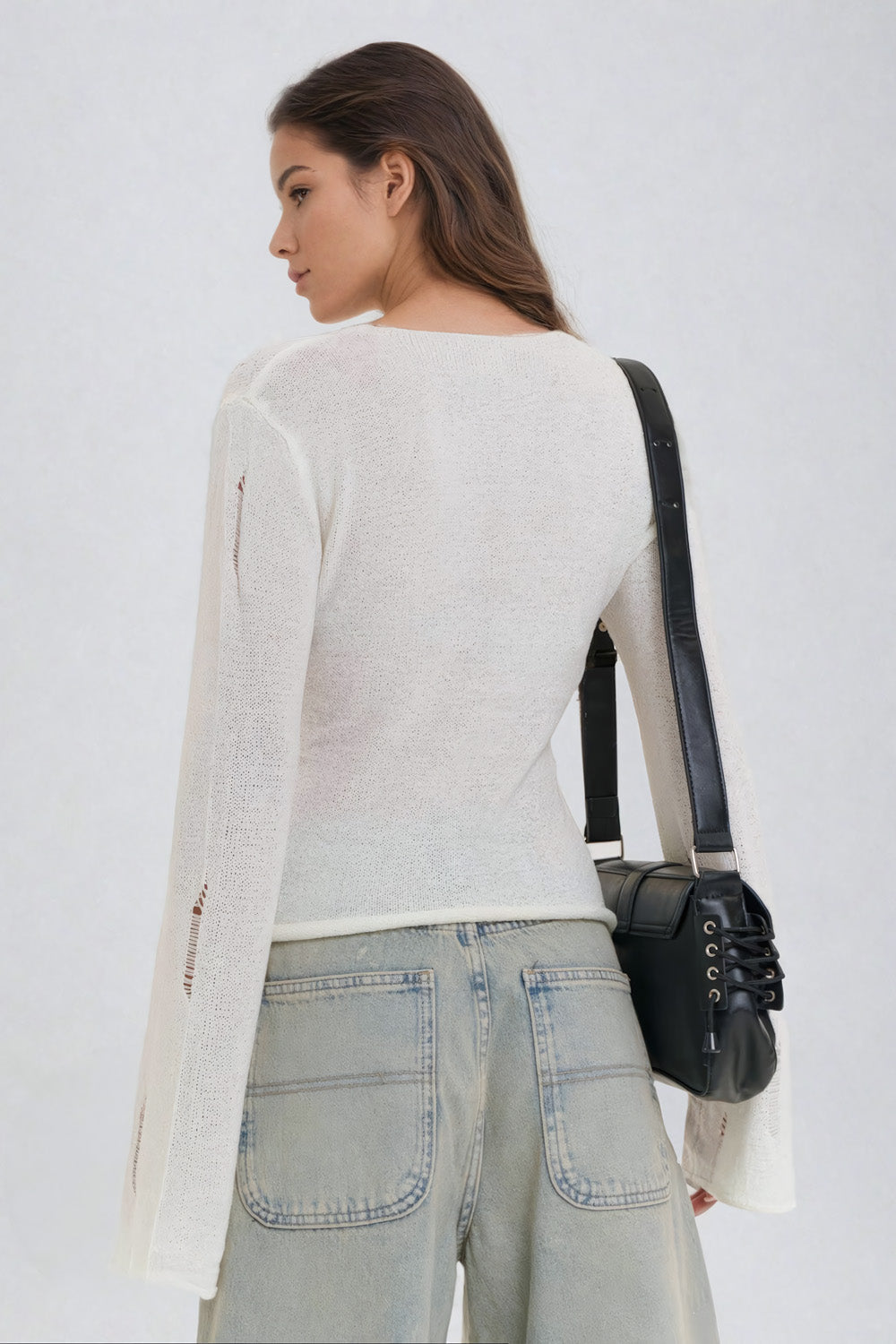 Knitted Sweater with Bow Accents and Distressed Detailing - White