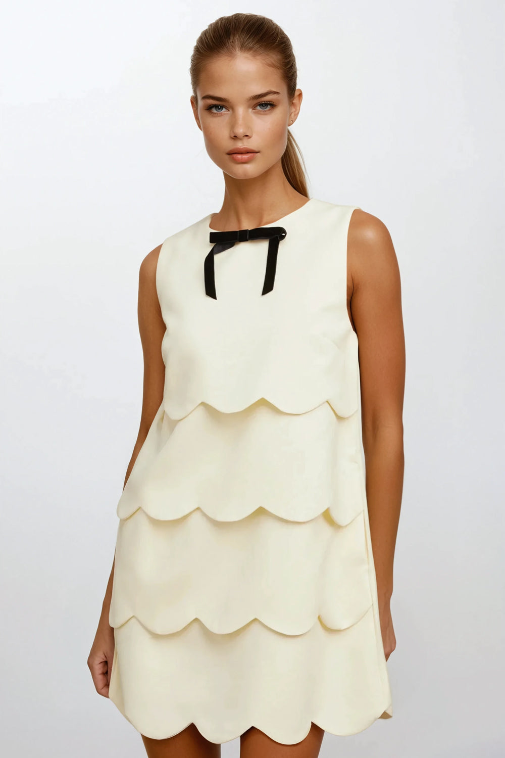 Sleeveless Scalloped Mini Dress with Bow Detail - White