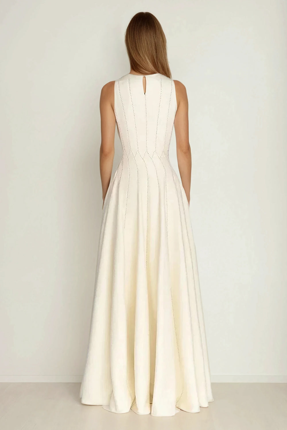 Sleeveless Maxi Dress with Structured Seams and Flared Hem - White