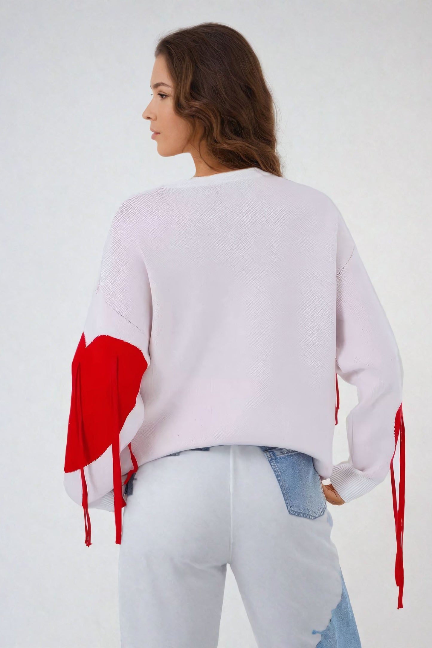 Heart-Embellished Sweater with Fringe Detailing - Light Pink