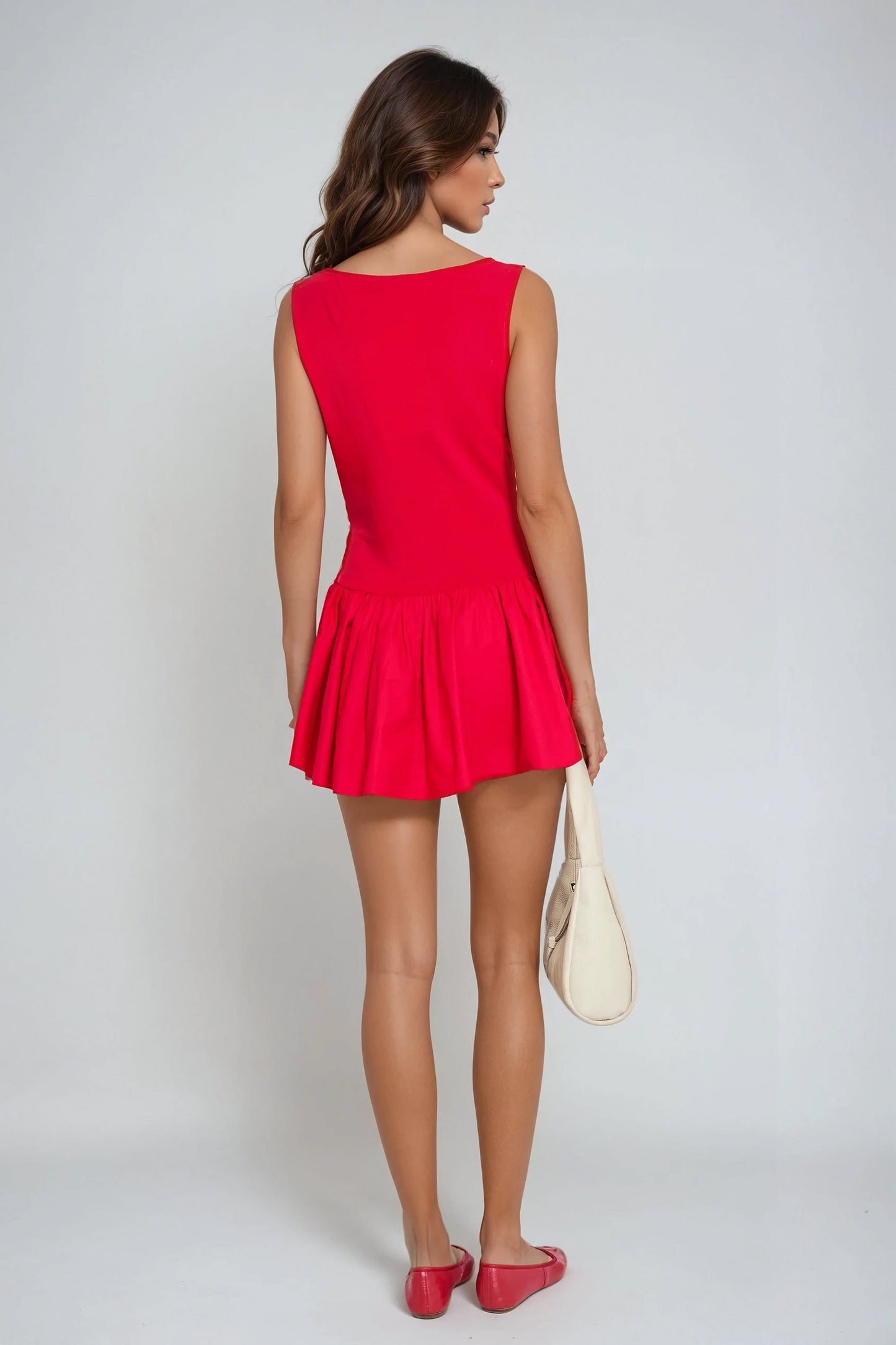 Sleeveless Mini Dress with Pleated Skirt - Red