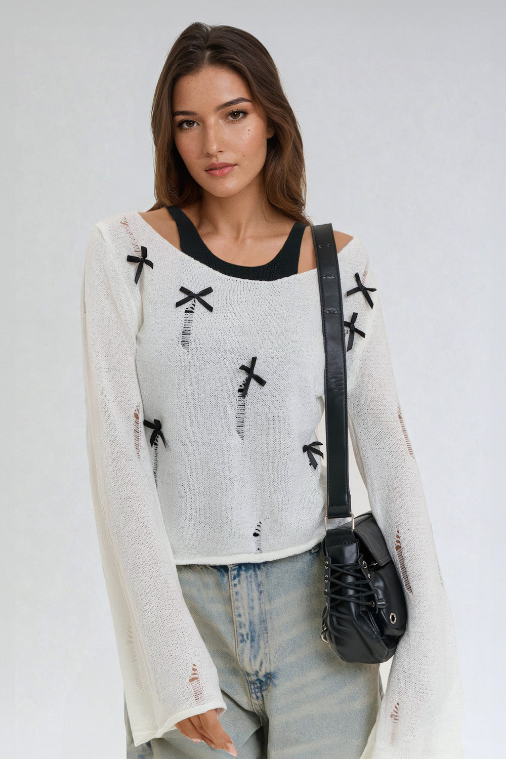 Knitted Sweater with Bow Accents and Distressed Detailing - White